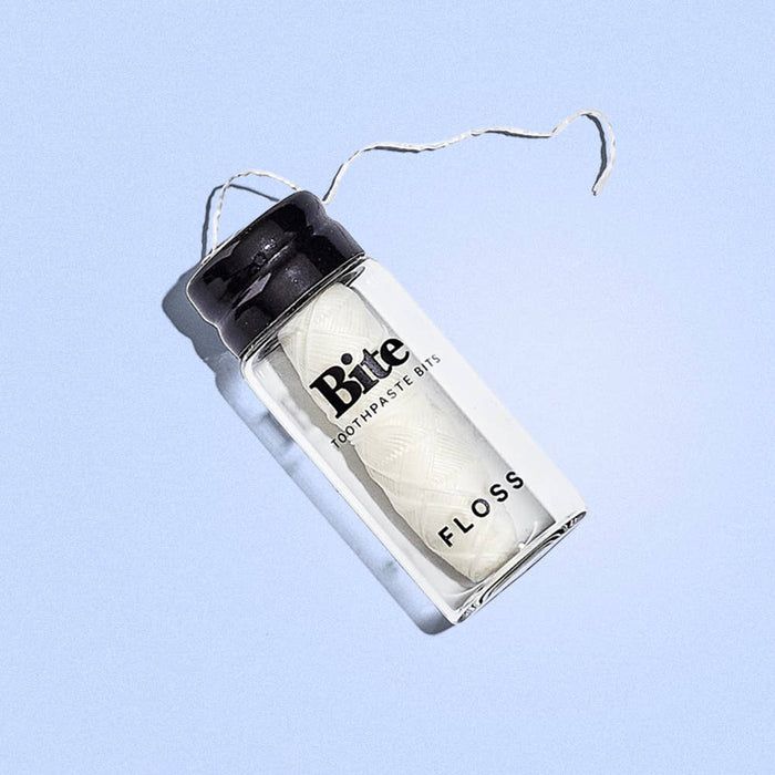Plant-Based Dental Floss in a Recyclable Glass Bottle (approx. 98 feet) Byome