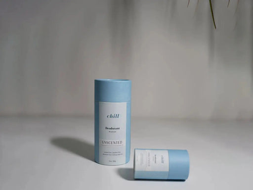 Two blue cylindrical containers labeled 'chill' on a neutral background