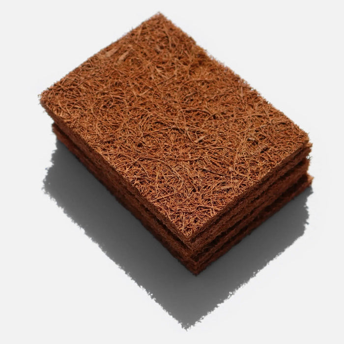 Stack of brown coconut coir mats on a white background
