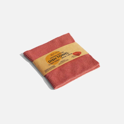 Red dish towel with a cardboard label on a white background