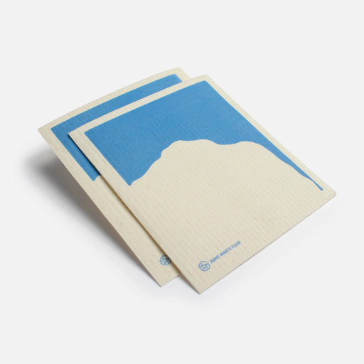 Two Swedish sponge cloth with mountain design on a white background