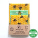 Set of three beeswax food wraps with honeycomb and bee design, certified food safe.